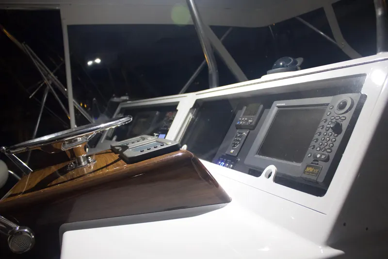 Slide: The Image of 2004 Hudson Custom Carolina boat dashboard at night. - 22