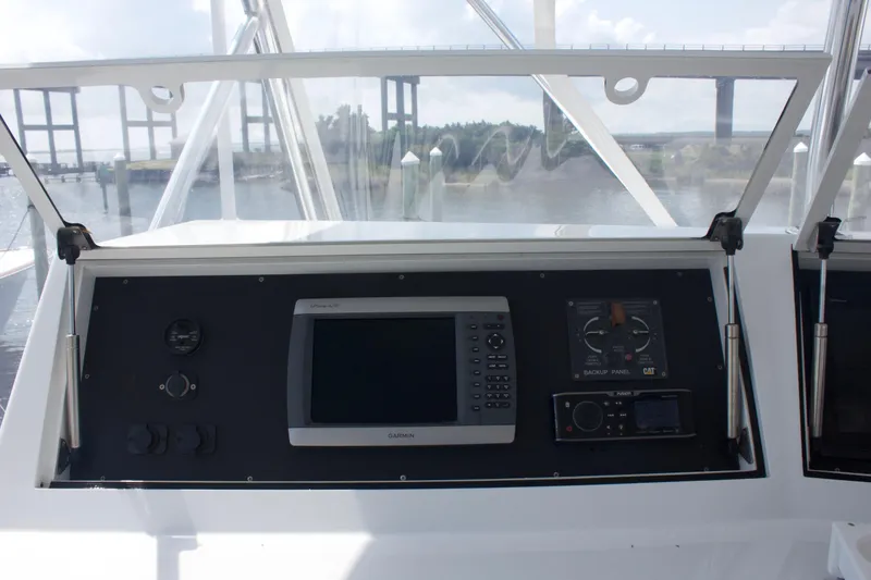 Slide: The Image of Hudson Custom Carolina 2004 boat console with navigation system. - 26