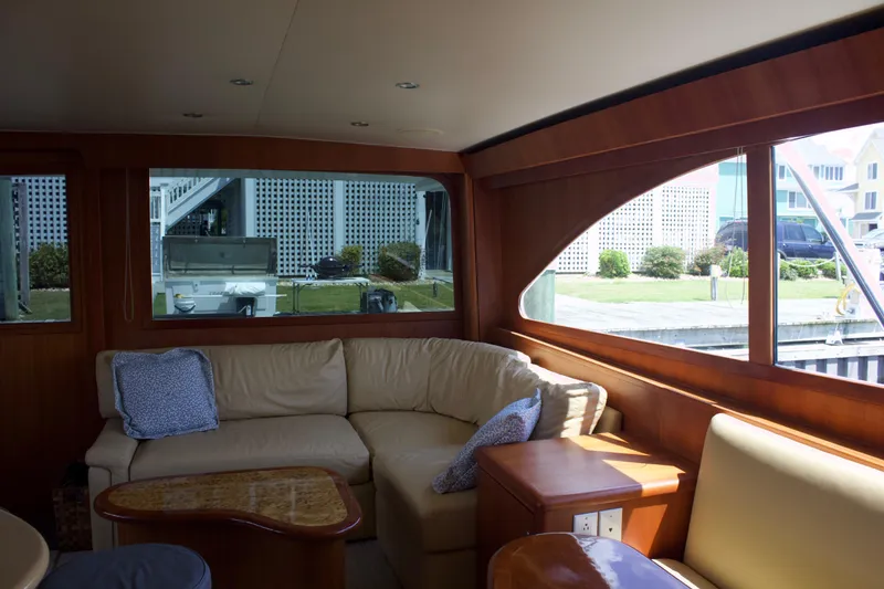Slide: The Image of Interior of a 2004 Hudson Custom Carolina yacht with leather sofa. - 30