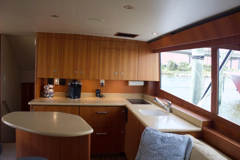 Slide: The Image of Interior of 2004 Hudson Custom Carolina yacht with modern kitchen. - 31