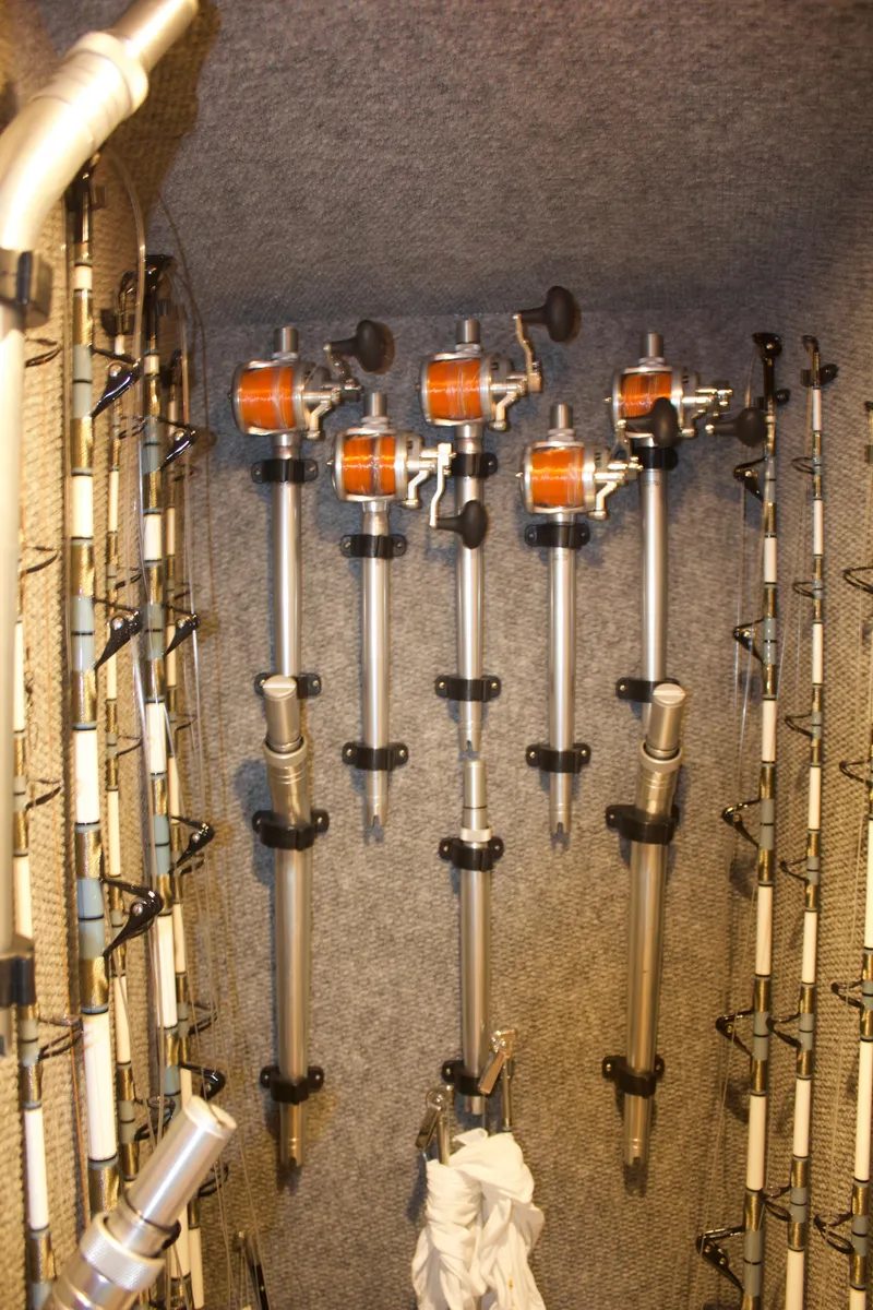 Slide: The Image of Fishing rod holders in Hudson Custom Carolina 2004 boat. - 38