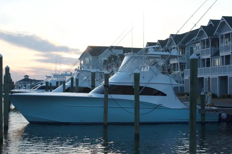 Slide: The Image of 2004 Hudson Custom Carolina yacht docked at sunset. - 5