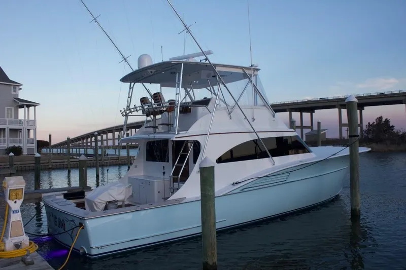 Slide: The Image of 2004 Hudson Custom Carolina yacht docked at sunset. - 6