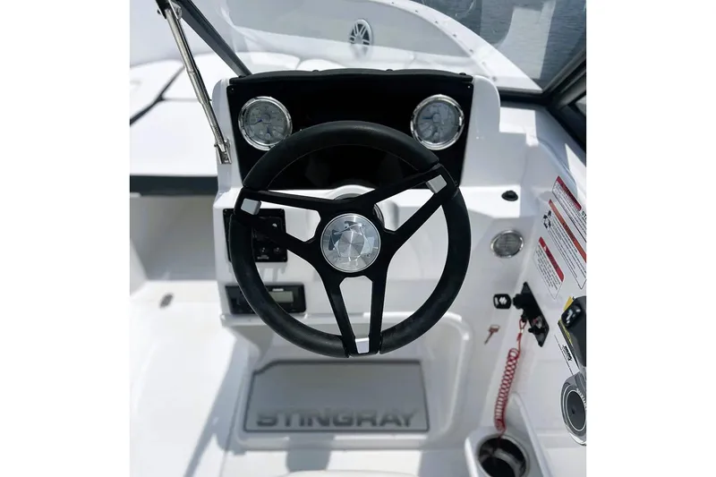 Slide: The Image of Manufacturer Provided Image: Steering wheel of 2026 Stingray 172 DC boat, featuring modern dashboard design. - 11