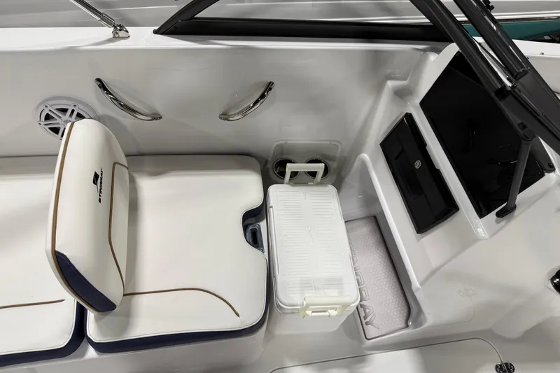 Slide: The Image of 2026 Stingray 172 DC boat interior with white seating, storage, and sleek design elements. - 5