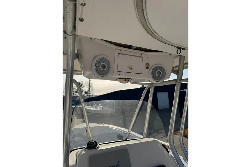 Slide: The Image of 2007 PROLINE 23 Sport boat console with speakers and windshield. - 14