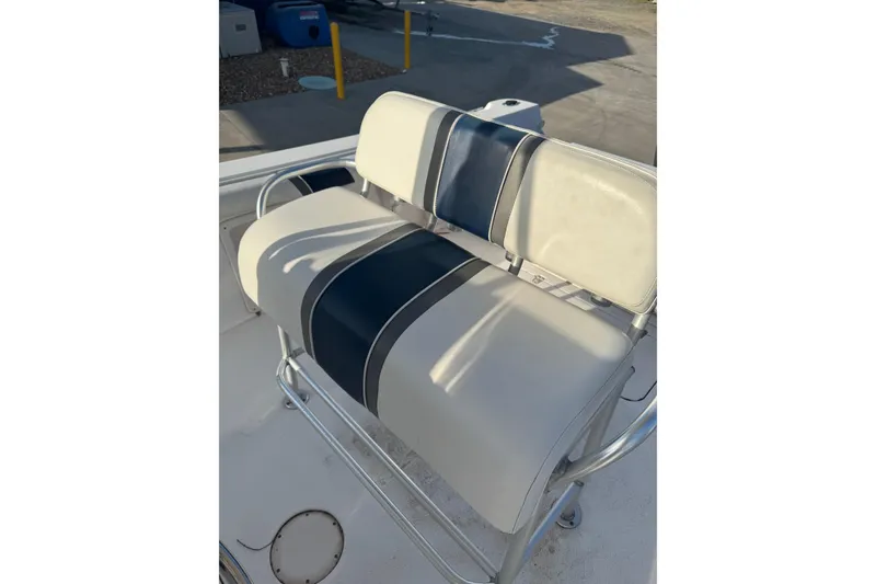 Slide: The Image of 2007 PROLINE 23 Sport boat seat with blue and white upholstery. - 15