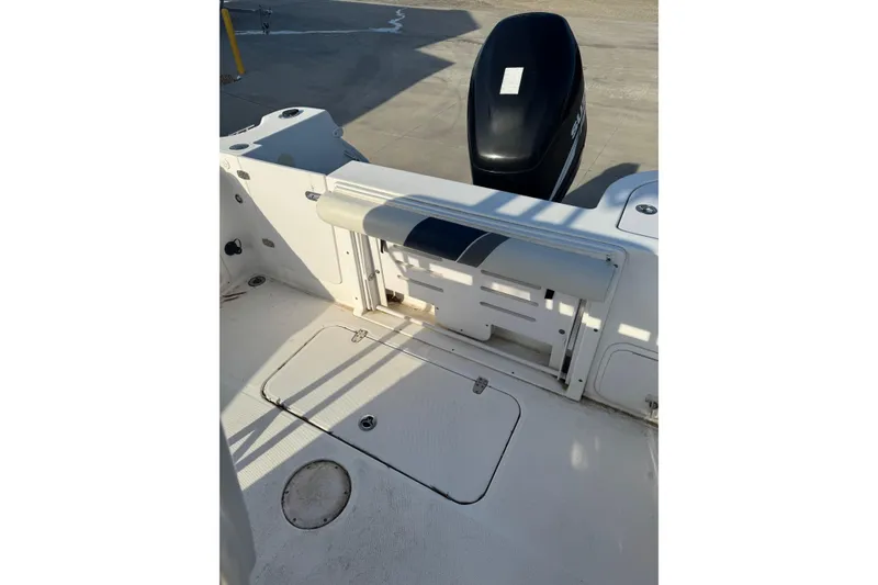 Slide: The Image of 2007 PROLINE 23 Sport boat interior with seating and engine view. - 16