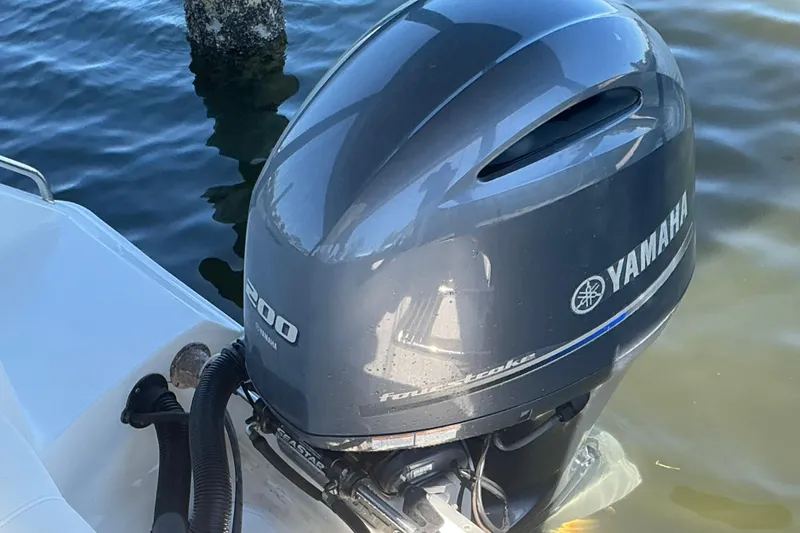Slide: The Image of Yamaha 200 horsepower outboard motor on 2016 Sea Hunt Ultra 225 boat. - 15
