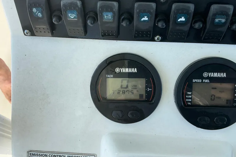 Slide: The Image of Control panel of a 2016 Sea Hunt Ultra 225 boat with Yamaha gauges. - 18