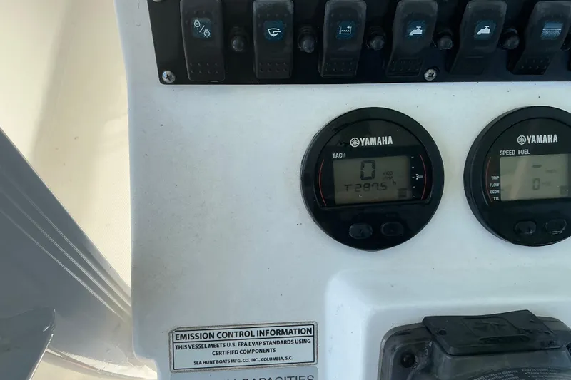 Slide: The Image of Control panel of a 2016 Sea Hunt Ultra 225 boat with Yamaha gauges. - 28