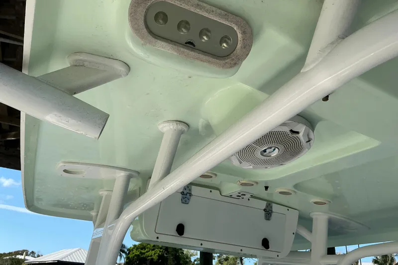 Slide: The Image of 2016 Sea Hunt Ultra 225 boat interior ceiling with speaker and light fixtures. - 30