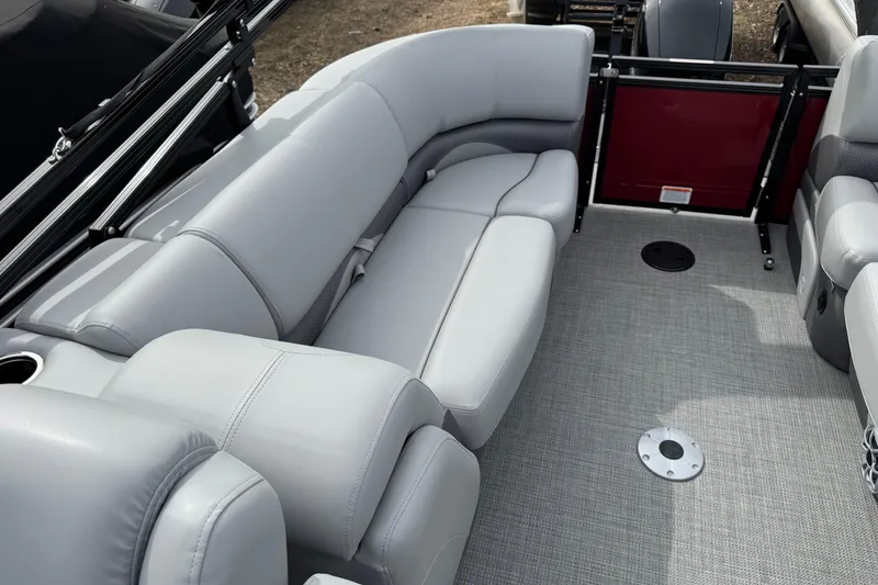 Slide: The Image of Luxurious seating on 2025 Regency 230 DL3 pontoon boat with sleek design and modern upholstery. - 12