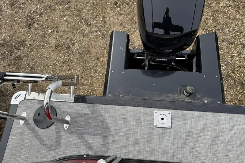 Slide: The Image of Top view of 2025 Regency 230 DL3 boat engine and deck details. - 14