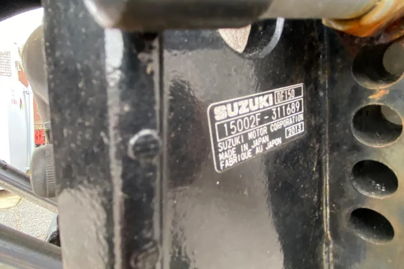 Slide: The Image of Close-up of a Suzuki DF150 engine label on a 1985 SISU Lobster Boat. - 6