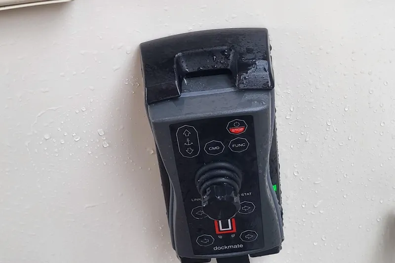 Slide: The Image of Remote control for 2018 Sea Ray L590 Fly yacht, featuring joystick and buttons. - 35