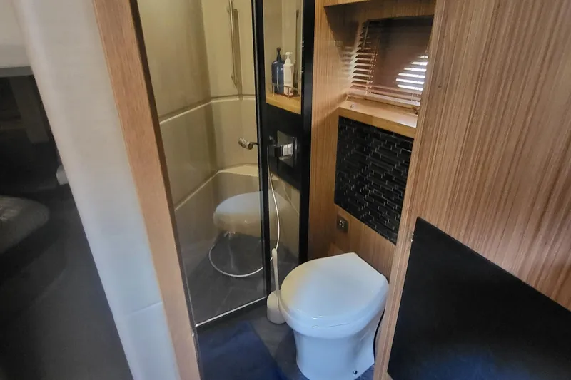 Slide: The Image of Luxurious bathroom in 2018 Sea Ray L590 Fly yacht with modern amenities. - 54