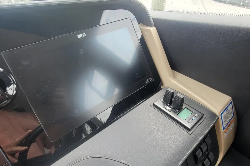 Slide: The Image of Control panel of 2018 Sea Ray L590 Fly yacht with touchscreen display. - 60
