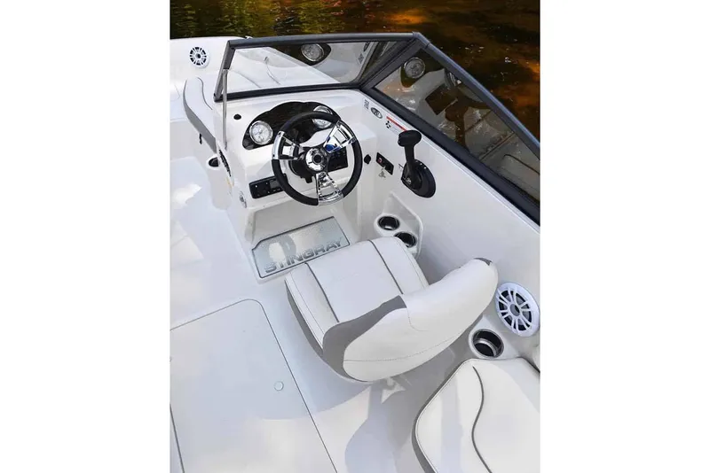 Slide: The Image of Manufacturer Provided Image: 2025 Stingray 191 DC boat interior with steering wheel and seating. - 6