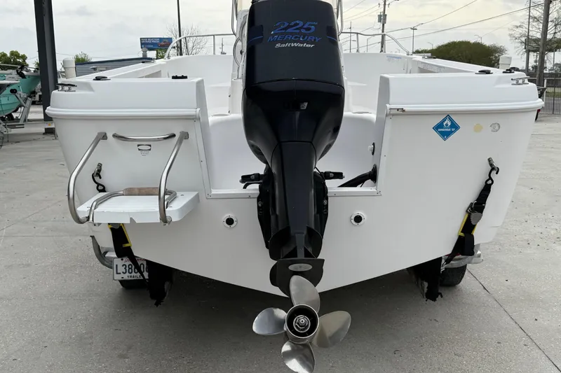 Slide: The Image of Rear view of a 2001 Pro-Line 22 Sport boat with Mercury 225 outboard motor. - 5
