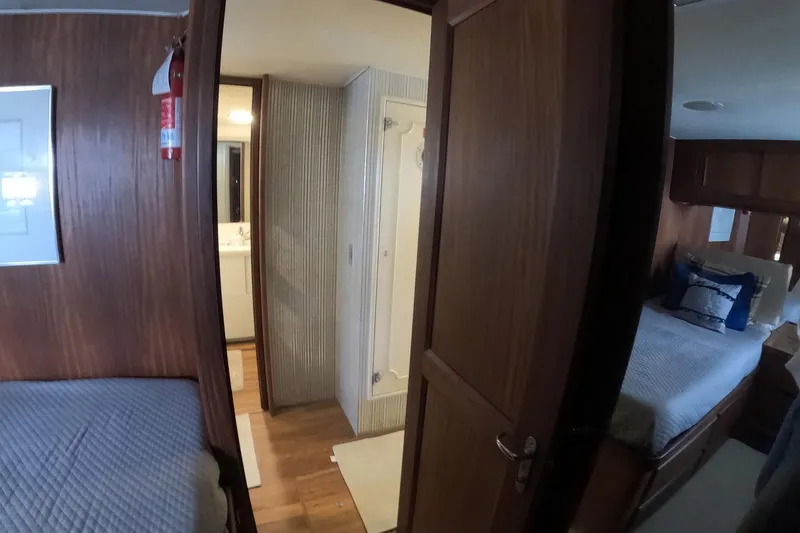 Slide: The Image of Interior of 1987 Hatteras 54 Motor Yacht with cozy bedrooms and bathroom. - 22