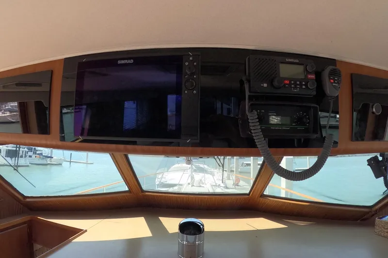 Slide: The Image of Interior helm of 1987 Hatteras 54 Motor Yacht with navigation equipment. - 4