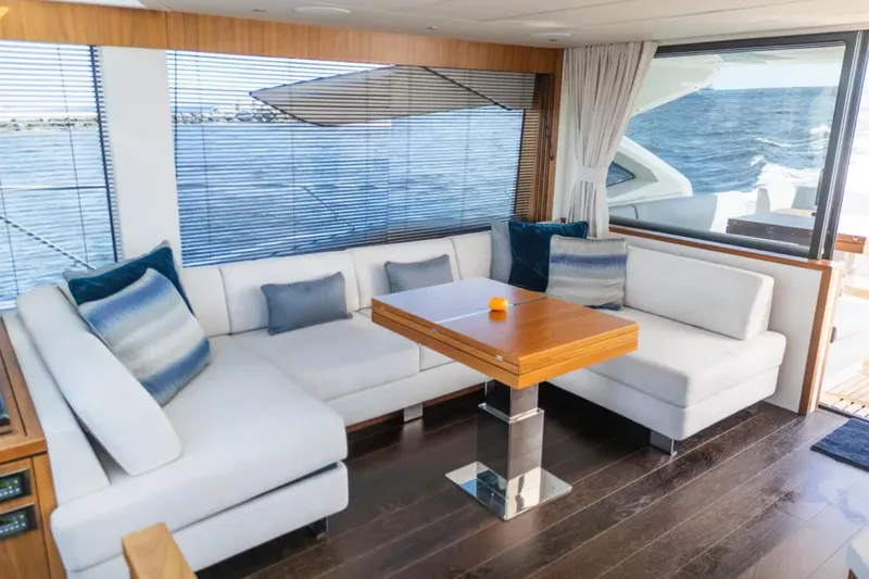 Slide: The Image of Luxurious interior of 2020 Sunseeker Predator 74 yacht with elegant seating and ocean view. - 10