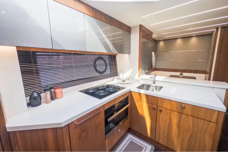 Slide: The Image of Luxurious kitchen interior of 2020 Sunseeker Predator 74 yacht with modern design. - 16