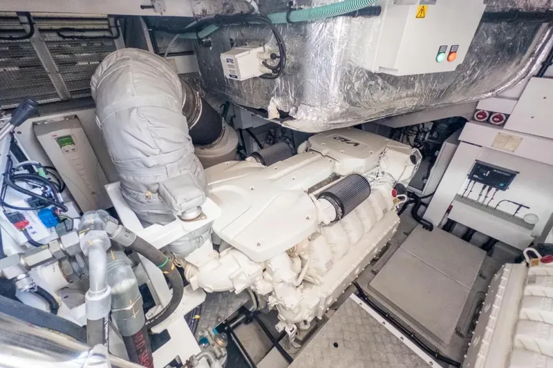 Slide: The Image of Engine room of 2020 Sunseeker Predator 74 yacht, showcasing advanced machinery and components. - 23