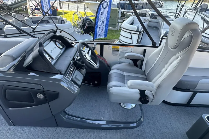 Slide: The Image of Captain's seat and helm of 2026 Godfrey Monaco 235 SFL pontoon boat. - 11