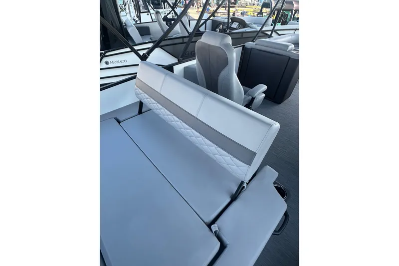 Slide: The Image of 2026 Godfrey Monaco 235 SFL boat interior with luxurious seating and modern design. - 17