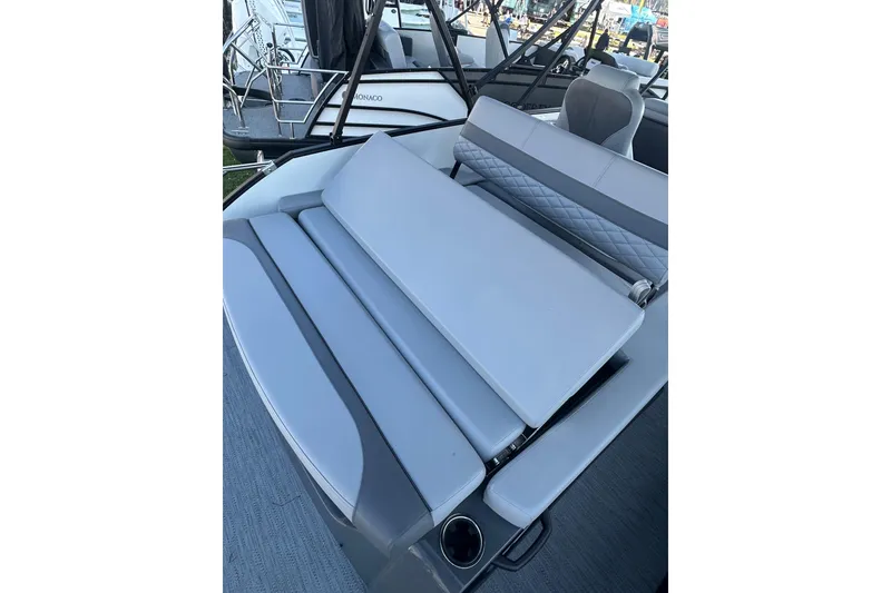 Slide: The Image of 2026 Godfrey Monaco 235 SFL boat interior with luxurious seating and modern design. - 19