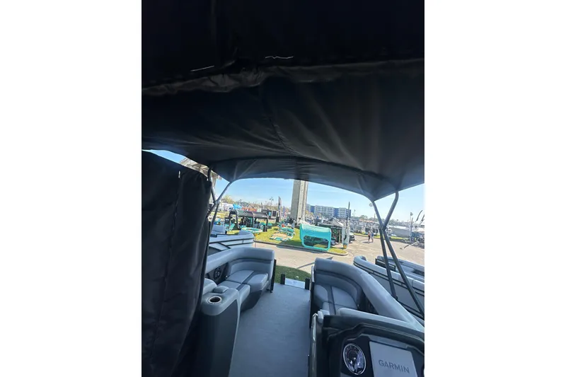 Slide: The Image of Interior view of 2026 Godfrey Monaco 235 SFL boat with seating and canopy. - 25