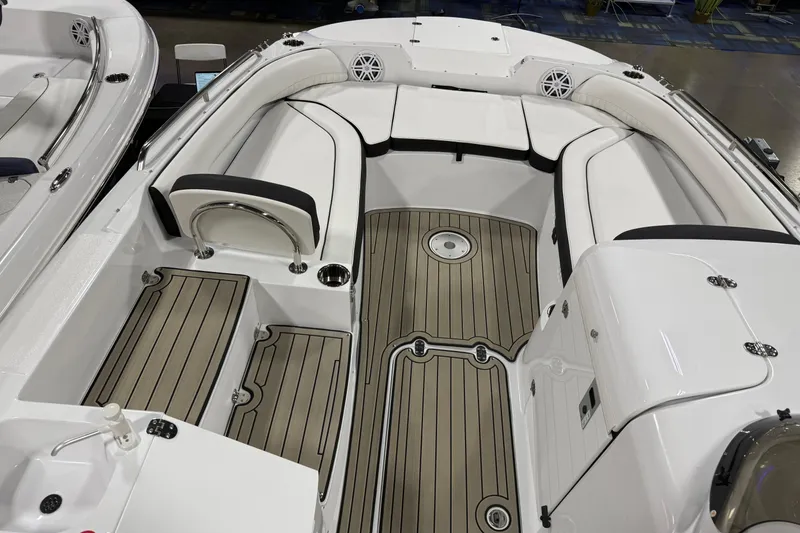 Slide: The Image of 2026 Stingray 212 SC boat interior with sleek seating and modern design. - 9