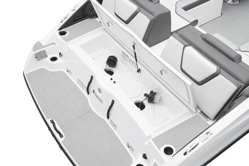 Slide: The Image of Manufacturer Provided Image: 2026 Yamaha Boats AR250 interior, featuring sleek seating and storage compartments. - 9
