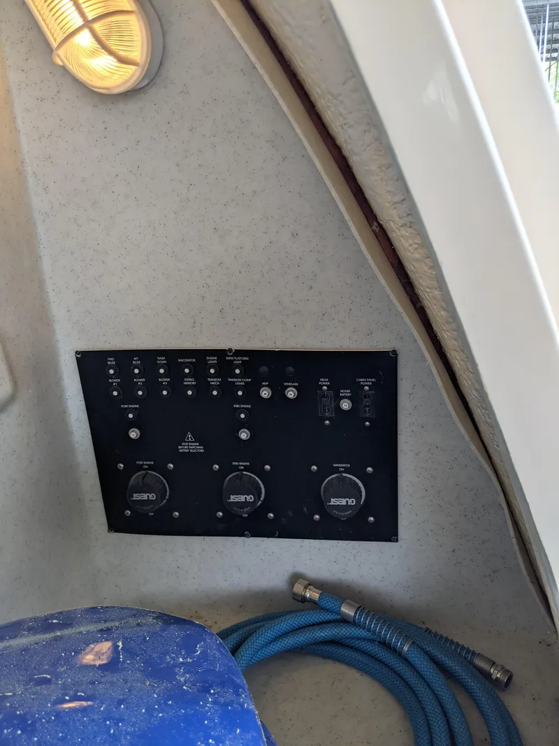 Slide: The Image of Control panel on a 2004 Rinker Fiesta Vee 410 boat interior. - 5