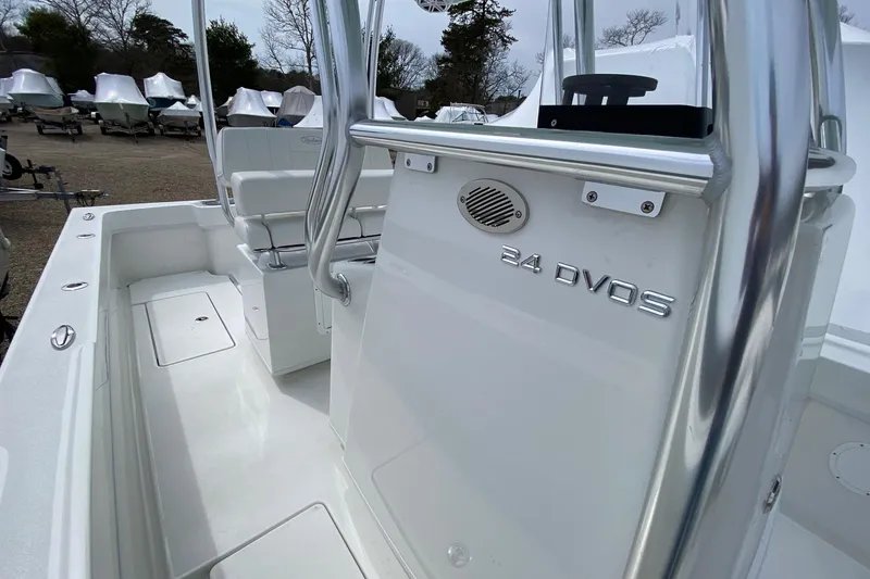 Slide: The Image of 2026 Pair Customs 24 Center Console DV Offshore boat interior with sleek design and seating. - 13