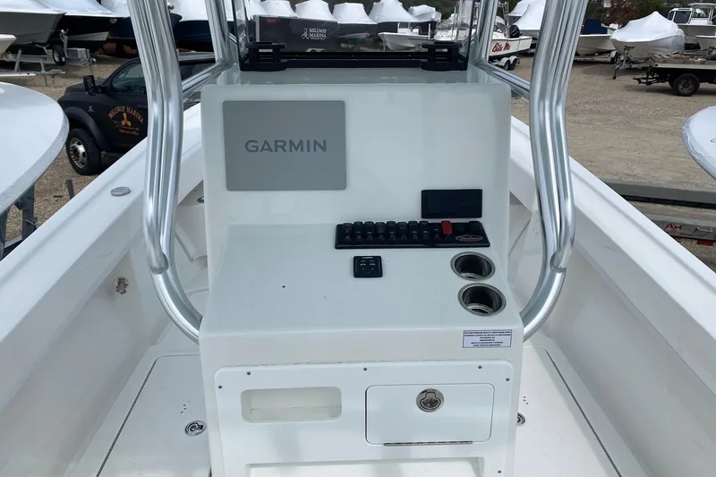 Slide: The Image of 2026 Pair Customs 24 Center Console DV Offshore boat with Garmin navigation system. - 7