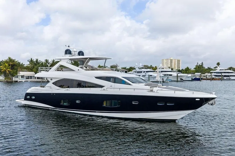 The Image of Luxurious 2012 Sunseeker 88 Yacht cruising on a serene waterway. - 0