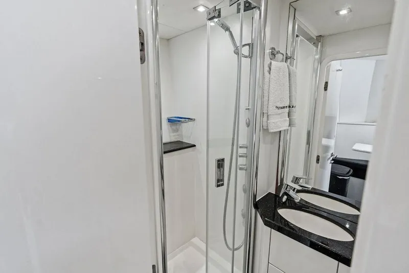 Slide: The Image of Luxurious bathroom in 2012 Sunseeker 88 Yacht with modern fixtures and dual sinks. - 102