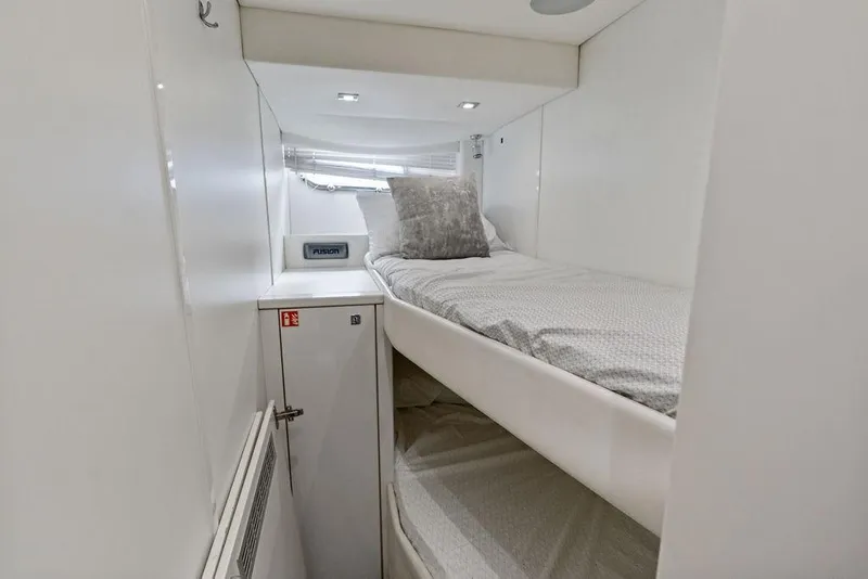 Slide: The Image of Compact cabin interior of 2012 Sunseeker 88 Yacht with bunk beds and modern design. - 104
