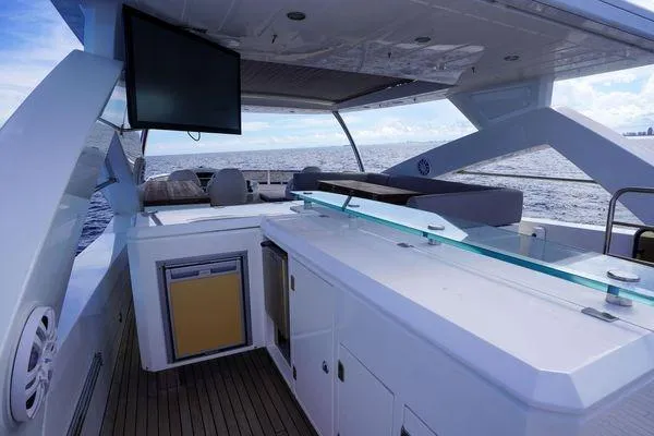 Slide: The Image of Luxurious Sunseeker 88 Yacht 2012 with outdoor bar and ocean view. - 11