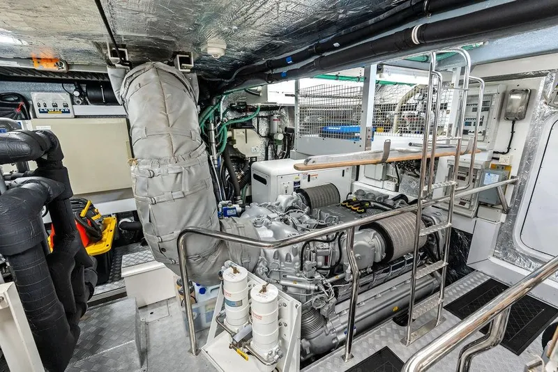 Slide: The Image of Engine room of a 2012 Sunseeker 88 Yacht, showcasing advanced machinery and equipment. - 115