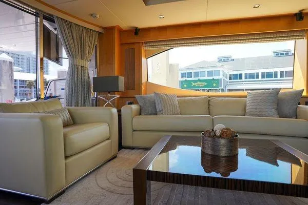 Slide: The Image of Luxurious interior of a 2012 Sunseeker 88 Yacht with elegant seating and modern decor. - 19