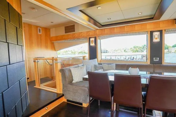 Slide: The Image of Luxurious interior of 2012 Sunseeker 88 Yacht with elegant dining area and scenic windows. - 22