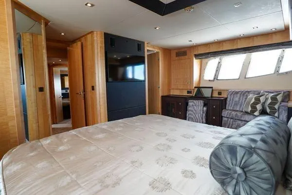 Slide: The Image of Luxurious Sunseeker 88 Yacht 2012 bedroom with elegant decor and large windows. - 33