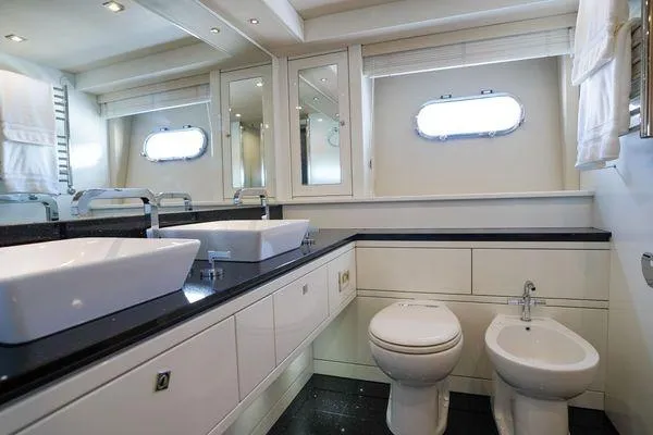 Slide: The Image of Luxurious bathroom on 2012 Sunseeker 88 Yacht with dual sinks and modern fixtures. - 35
