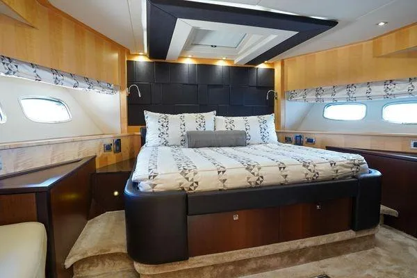 Slide: The Image of Luxurious bedroom interior of 2012 Sunseeker 88 Yacht with elegant bedding and modern design. - 38