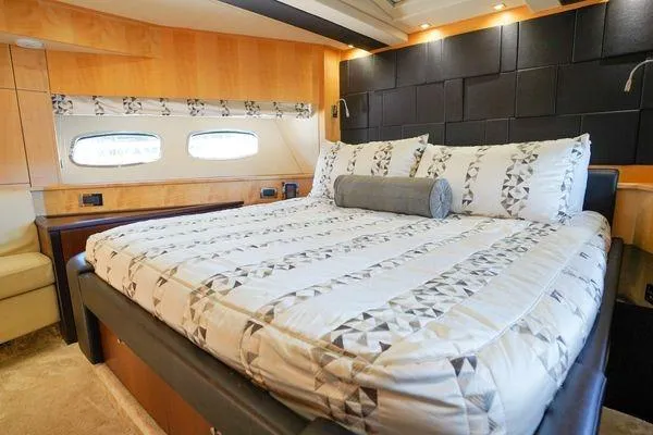 Slide: The Image of Luxurious bedroom interior of 2012 Sunseeker 88 Yacht with modern decor and large bed. - 39