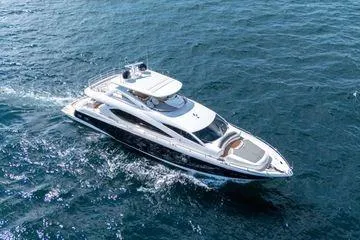 Slide: The Image of Luxurious 2012 Sunseeker 88 Yacht cruising on open water. - 4